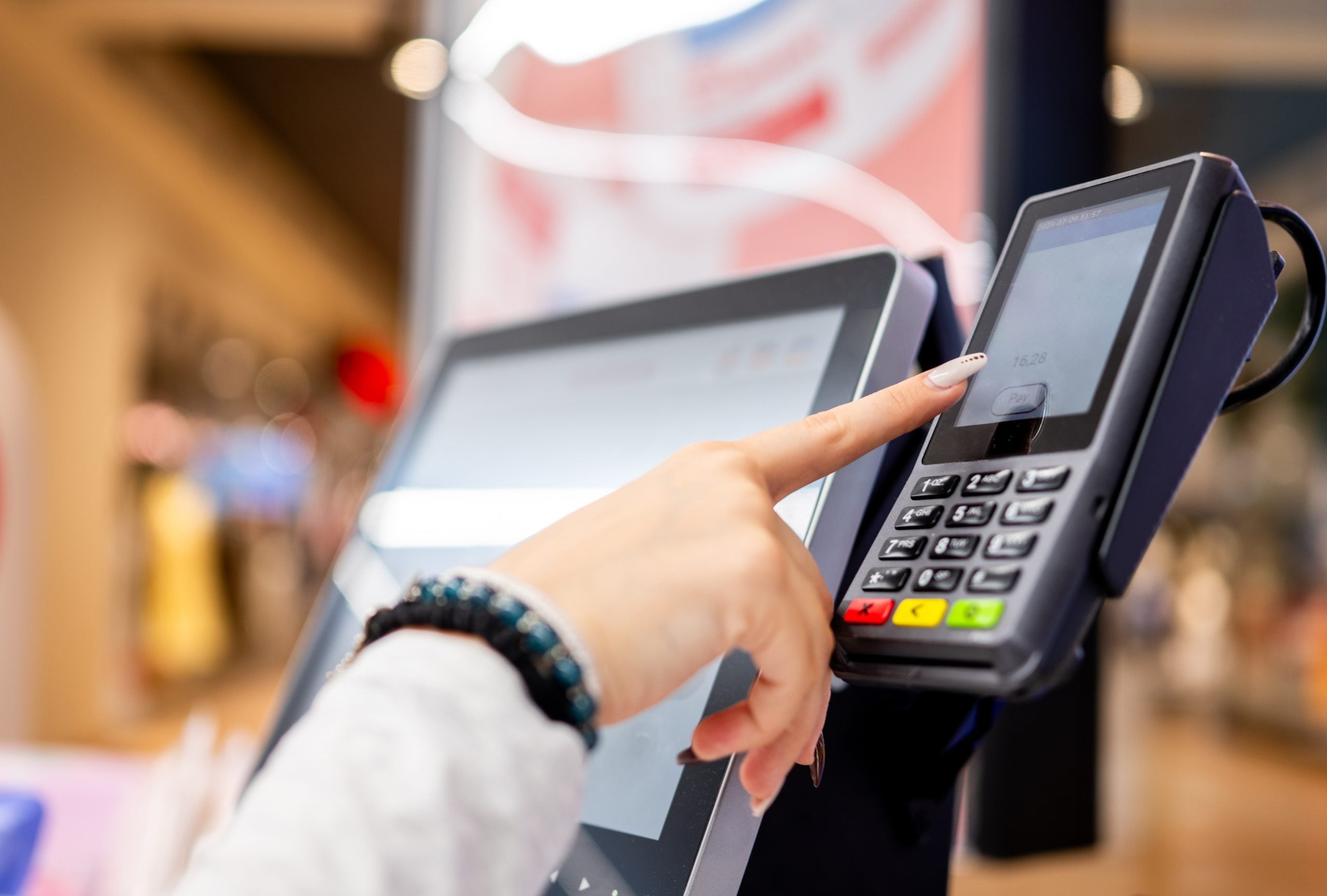 girl-paying-for-groceries-at-self-checkout-2026-01-09-12-07-20-utc